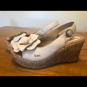 Born BOC off white cork wedge with flower. Size 6